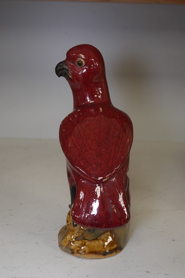 A Chinese flambé glazed figure of a bird, 20.5cm high. Condition - fair to good.